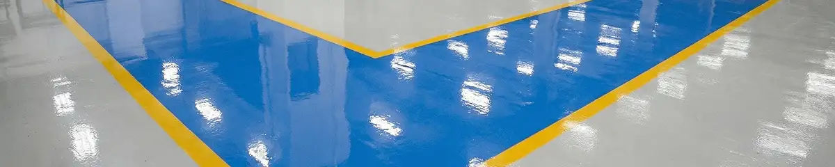 A factory floor professionally covered and marked with epoxy flooring in Tempe, AZ