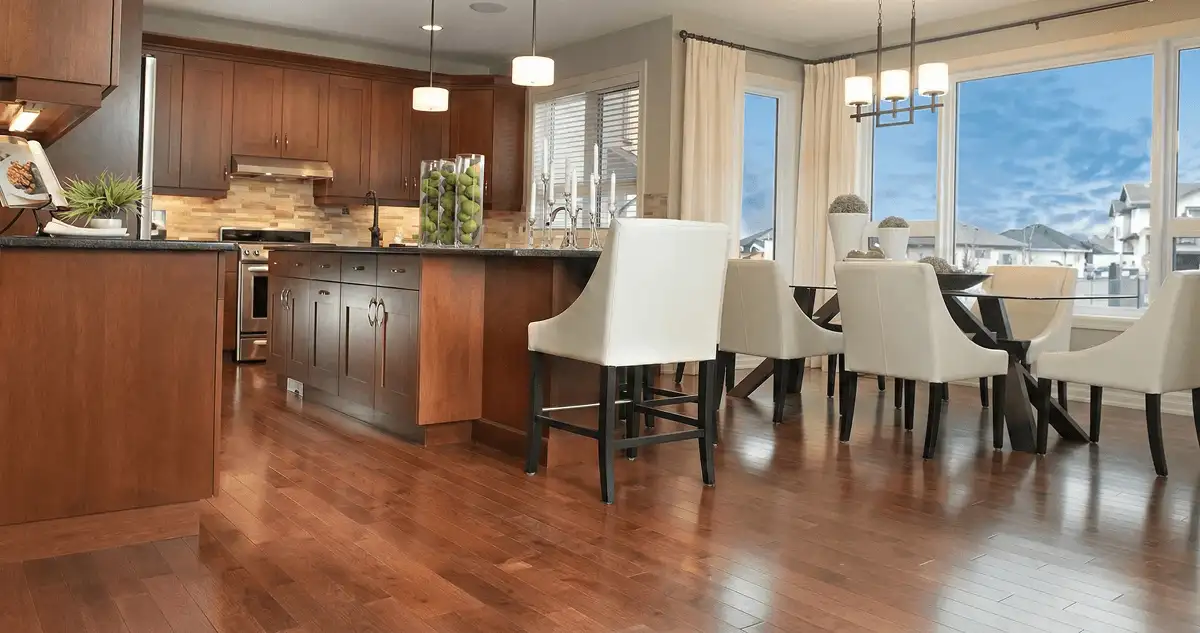 A modern kitchen with professionally installed wood flooring in Tempe, AZ